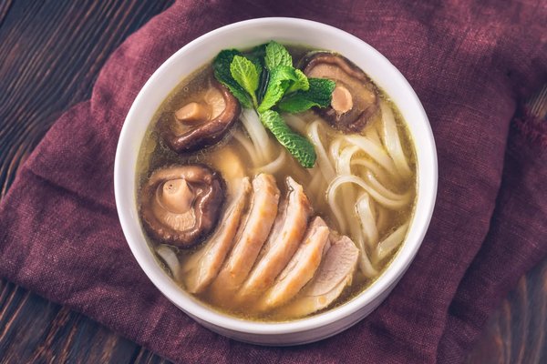 How can you make authentic Japanese ramen with a rich pork bone broth at home?